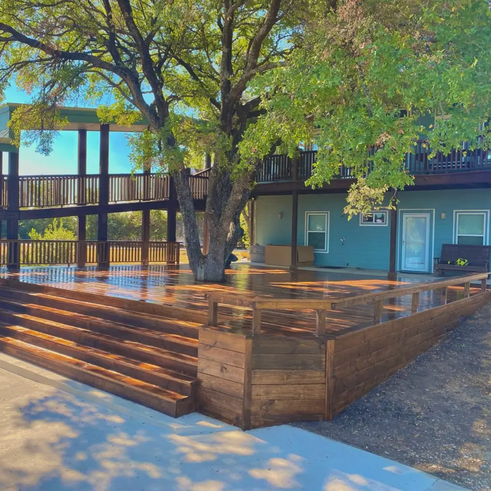deck builder built a big deck around a tree built in waxahachie texas by Pergola, Patio Covers, Deck Builders at RHH Construction 2