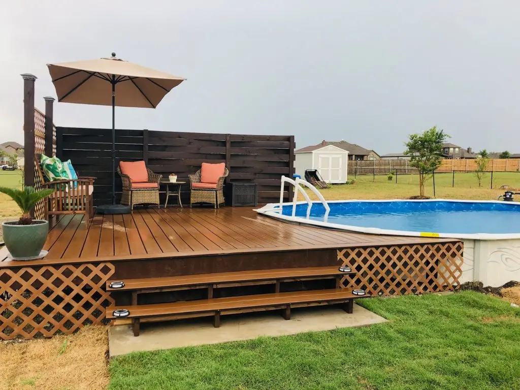 deck contractor in dallas texas builds above ground poolside composite deck